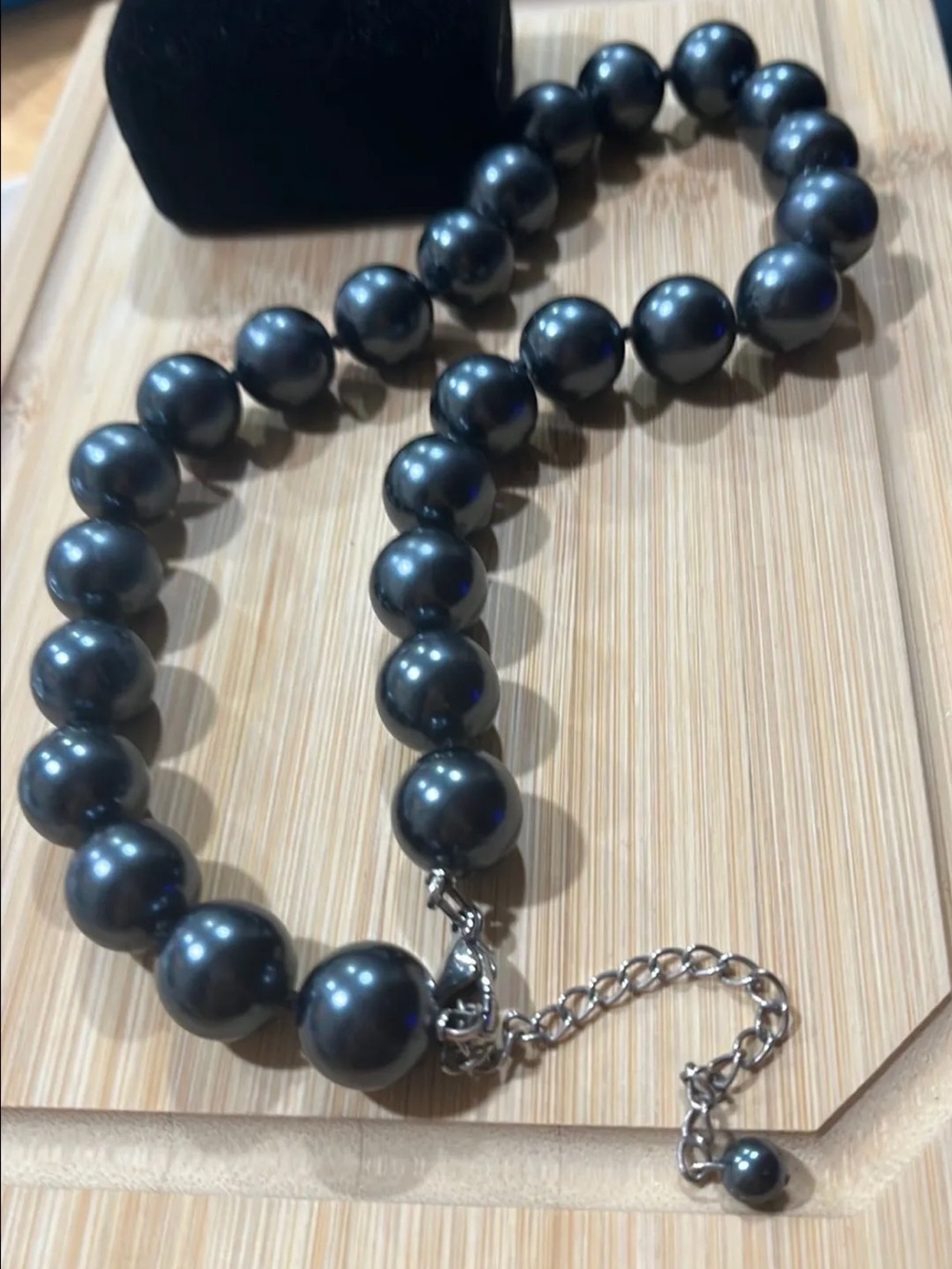 Black pearl necklace. Nice extension with small pearl charm, 16”
